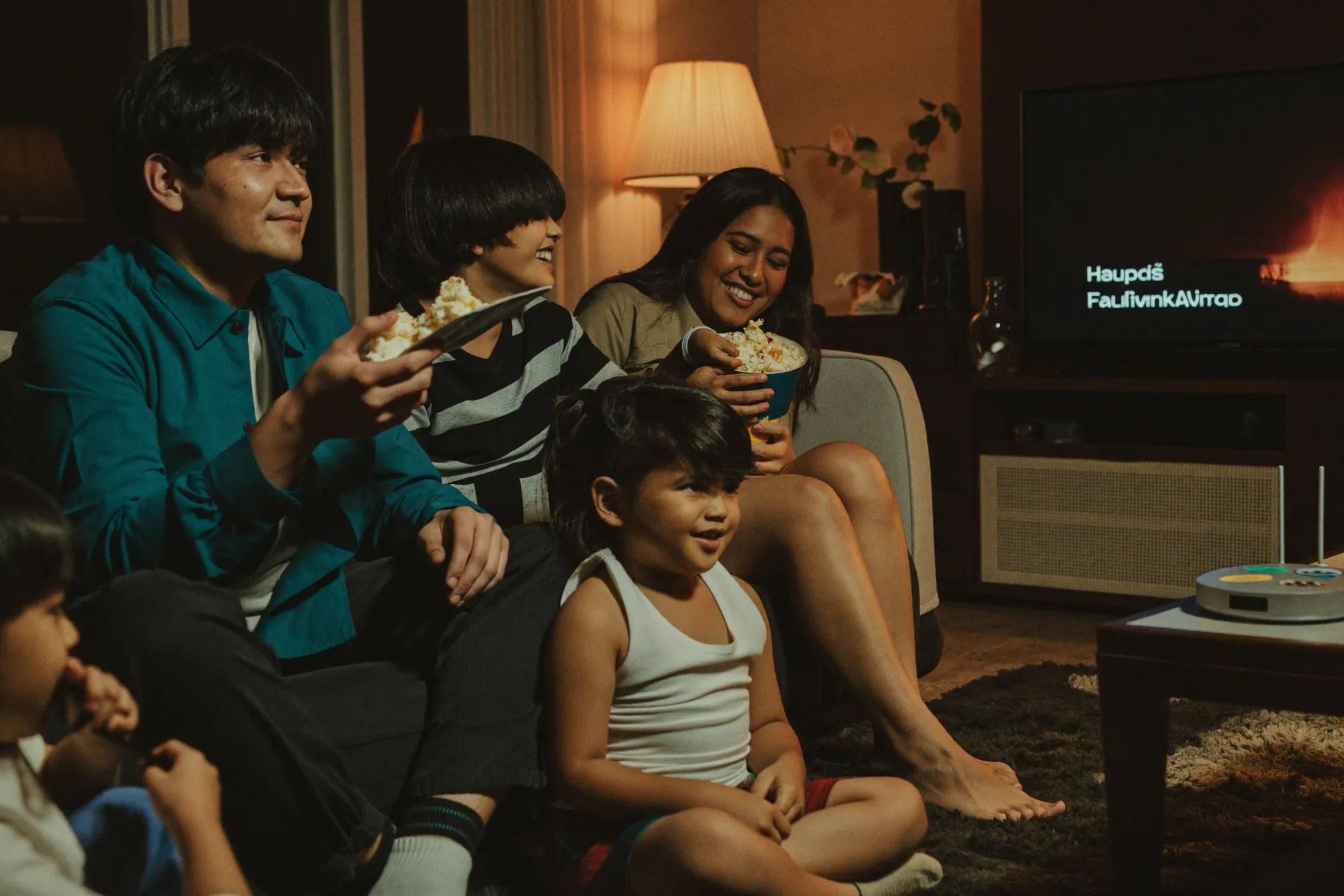 Filipino family enjoying a movie night on fast internet