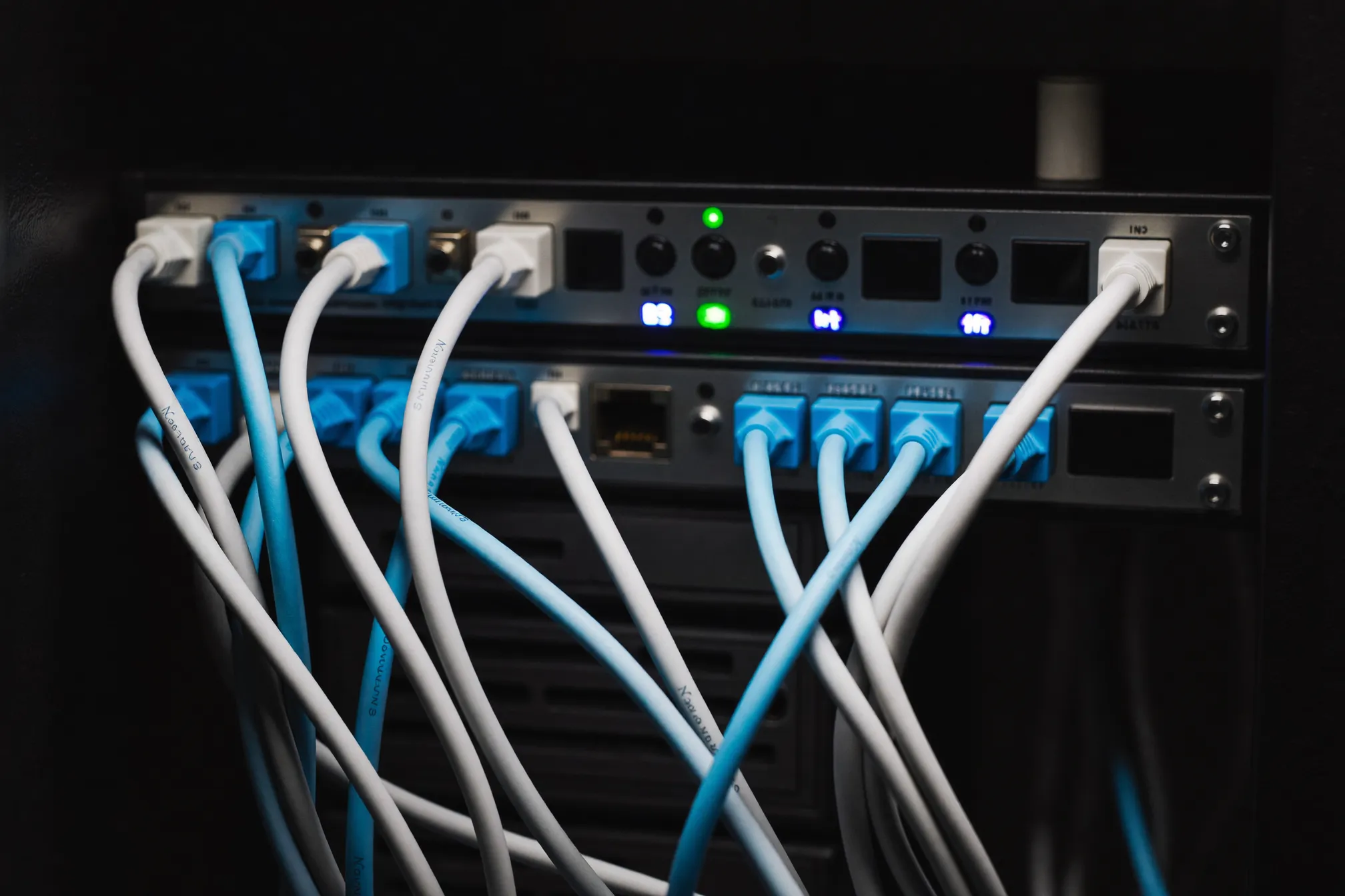 Rack-mounted router with glowing network cables